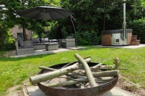 Vrijstaande 6 persoons Bungalow hottub en pizzaoven op vakantiepark